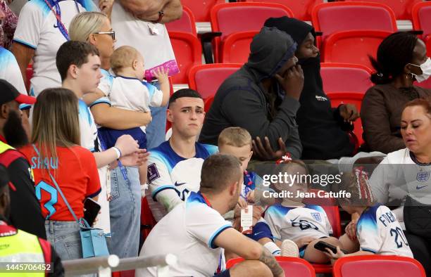 Phil Foden of England with his wife Rebecca Cooke following the FIFA World Cup Qatar 2022 Group B match between Wales and England at Ahmad Bin Ali...