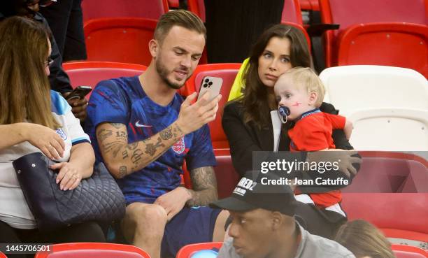 James Maddison of England of England with Kennedy Alexa following the FIFA World Cup Qatar 2022 Group B match between Wales and England at Ahmad Bin...