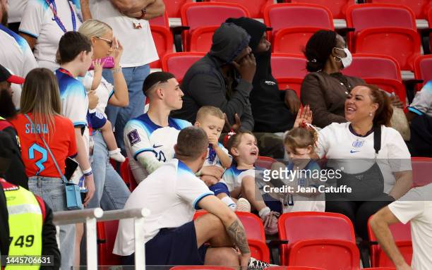 Phil Foden of England with his wife Rebecca Cooke following the FIFA World Cup Qatar 2022 Group B match between Wales and England at Ahmad Bin Ali...