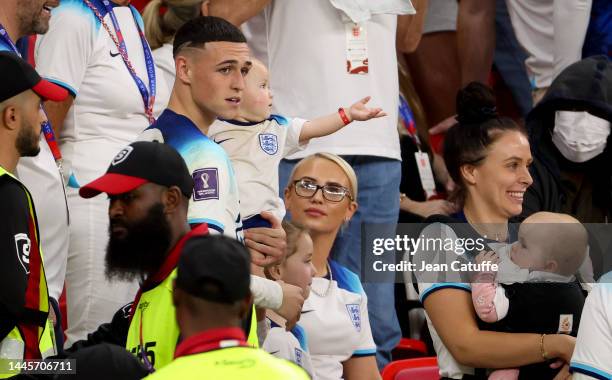 Phil Foden of England with his wife Rebecca Cooke following the FIFA World Cup Qatar 2022 Group B match between Wales and England at Ahmad Bin Ali...