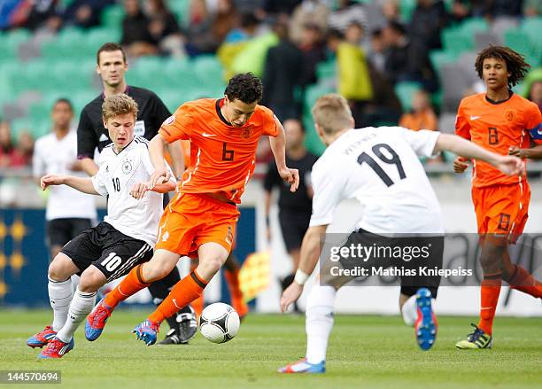 Thom Haye of Netherlands runs with the ball during the UEFA U17 European Championship game between Netherlands and Germany at SRC Stozice Stadium on...