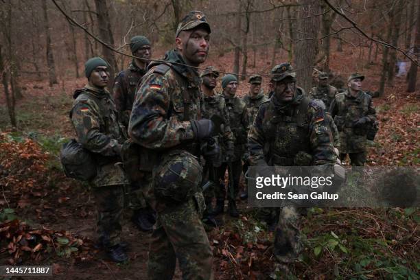 New army recruits of the Bundeswehr, Germany's armed forces, participate in basic training in a forest on November 29, 2022 near Prenzlau, Germany....