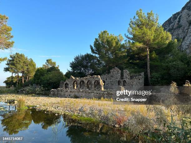 lake in front of olympos ruins, cirali, kemer, antalya, anatolia, turkey - kemer stock-fotos und bilder