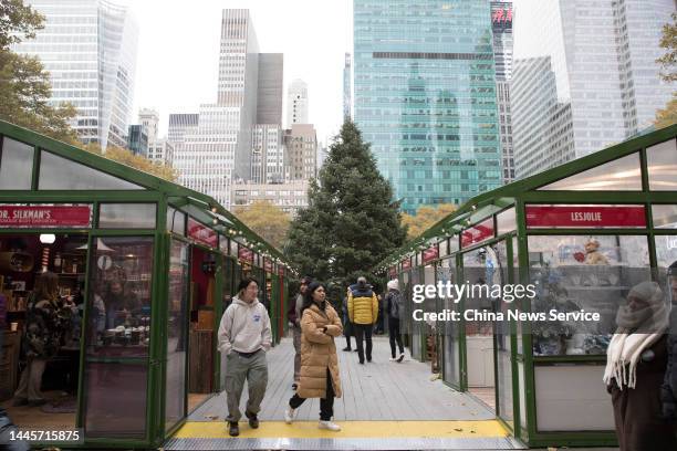 People visit holiday market at Bryant Park on November 29, 2022 in New York City.