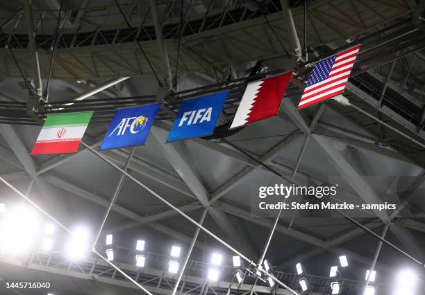 Iran, USA and Qatar flag in the stadium during the FIFA World Cup Qatar 2022 Group B match between IR Iran and USA at Al Thumama Stadium on November...