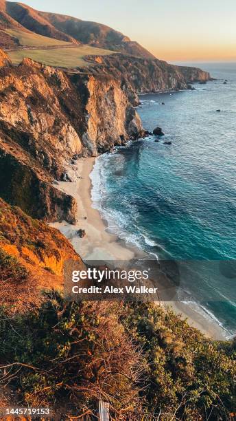 big sur californian coastline at sunset. - monterey peninsula stock pictures, royalty-free photos & images