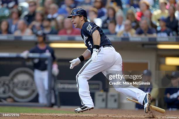 Taylor Green of the Milwaukee Brewers makes runs to first base on contact during the game against the Chicago Cubs at Miller Park on May 13, 2012 in...