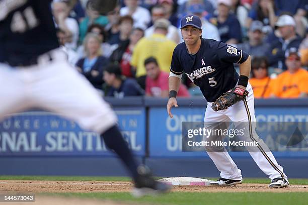 Taylor Green of the Milwaukee Brewers in action at first base during the game against the Chicago Cubs at Miller Park on May 13, 2012 in Milwaukee,...