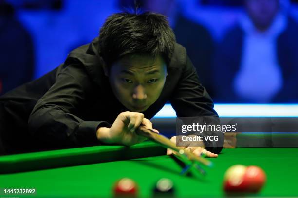 Lyu Haotian of China plays a shot during the first round match against Ryan Day of England on day three of the 2022 BetVictor Scottish Open at the...