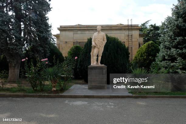 Statue of Georgian born Soviet leader Joseph Stalin is displayed in the courtyard of Stalin Museum behind the house where he was born on October 17,...