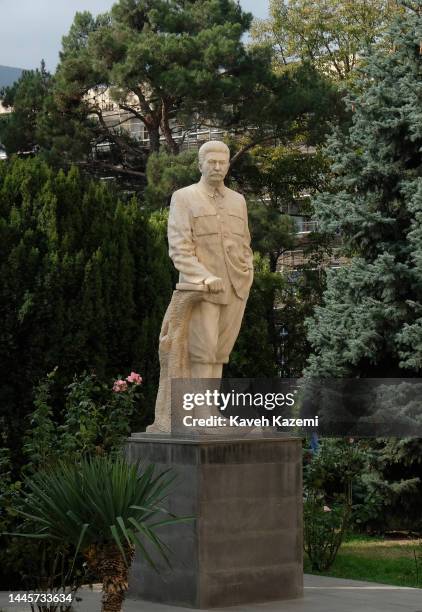Statue of Georgian born Soviet leader Joseph Stalin is displayed in the courtyard of Stalin Museum behind the house where he was born on October 17,...