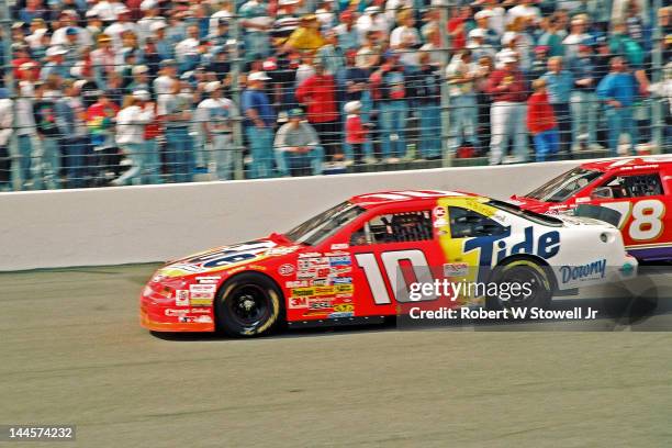 Tide's car on the track during the Winston Cup Race at the Charlotte Motor Speedway, Charlotte, North Carolina, 1997.