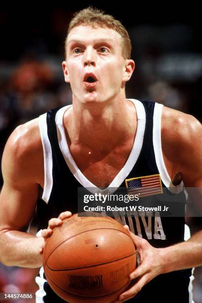 Basketball player Arron Bain of Villanova University lines up a free-throw at the foul line during a game against the University of Connecticut,...