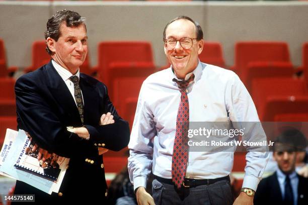 American basketball coaches Jim Calhoun , of the University of Connecticut, and Jim Boeheim, of Syracuse University, talk before a game, Hartford,...