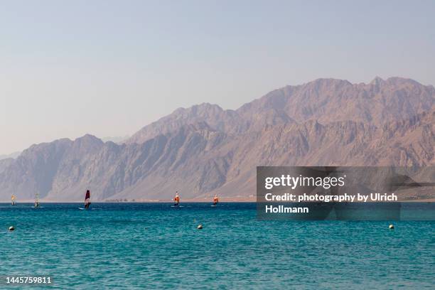 kite surfer at dahab lagoon, sinai, egypt - sinai egypt stock pictures, royalty-free photos & images