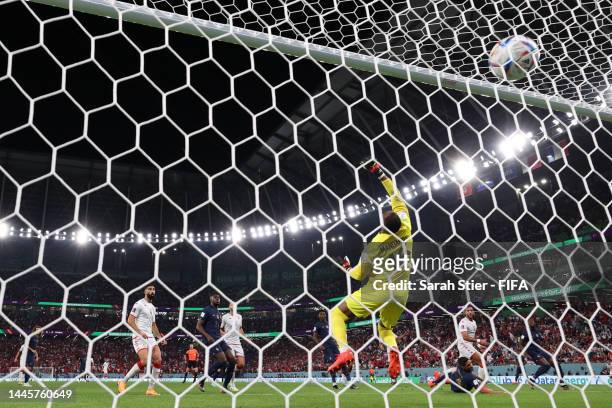 Nader Ghandri of Tunisia scores a goal past Steve Mandanda of France that was ruled offside during the FIFA World Cup Qatar 2022 Group D match...