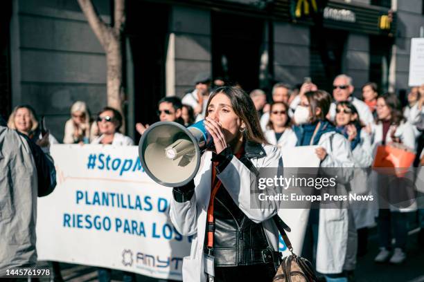 Woman with a megaphone protests during a demonstration by doctors and pediatricians from the Regional Ministry of Health to the regional government...