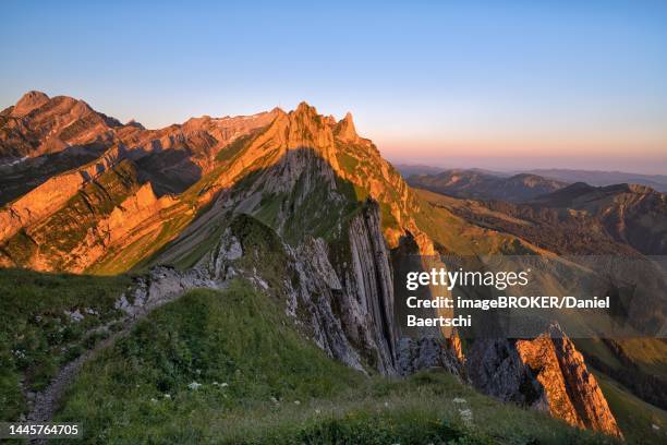 view of the alpstein mountains in appenzell, cloudless sky in the morning light, canton appenzell innerrhoden, switzerland - appenzell innerrhoden stock pictures, royalty-free photos & images