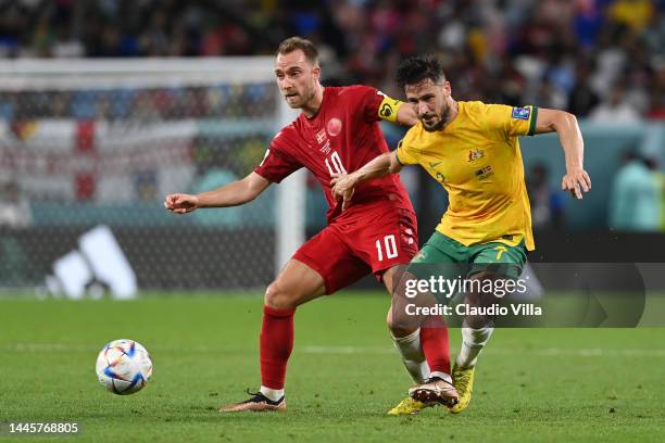 Christian Eriksen of Denmark battles for possession with Mathew Leckie of Australia during the FIFA World Cup Qatar 2022 Group D match between...