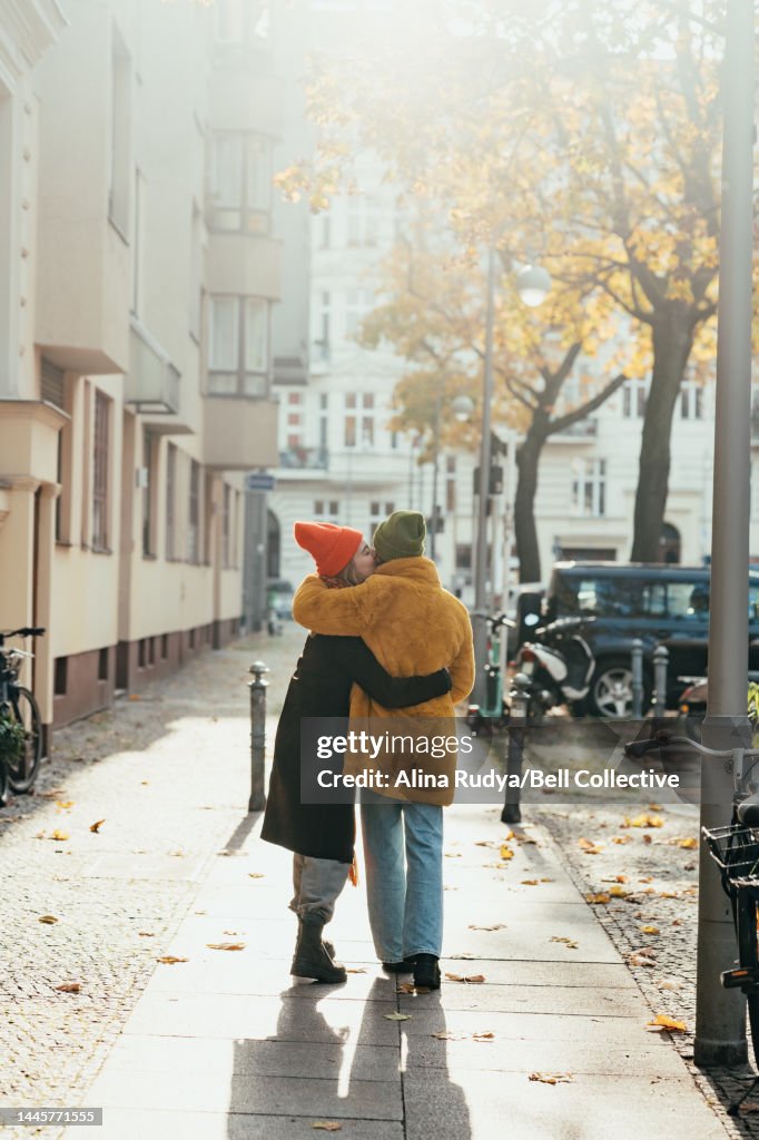 Lesbian couple having a romantic moment on the street