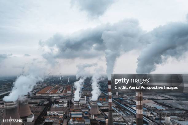 drone point view of power station - factory smog stock pictures, royalty-free photos & images