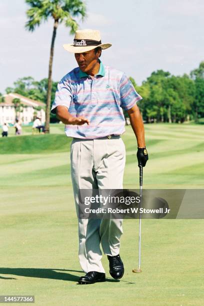 Japanese golfer Isao Aoki on the course during the PGA Seniors' Championship at the PGA National Golf Club, Palm Beach Gardens, Florida, 1996.