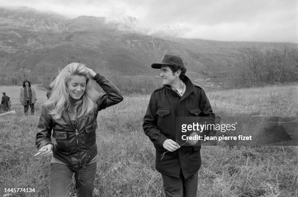 Catherine Deneuve and director Claude Lelouch on the set of Lelouch's 1979 film A Nous Deux .