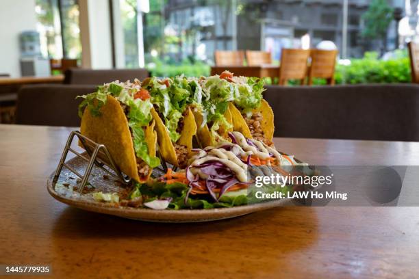 ground beef tacos - mexican food on table stock pictures, royalty-free photos & images