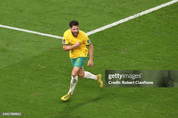 Mathew Leckie of Australia celebrates after scoring their team's first goal during the FIFA World Cup Qatar 2022 Group D match between Australia and...