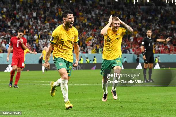 Mathew Leckie of Australia celebrates after scoring their team's first goal with their teammate Riley McGree during the FIFA World Cup Qatar 2022...