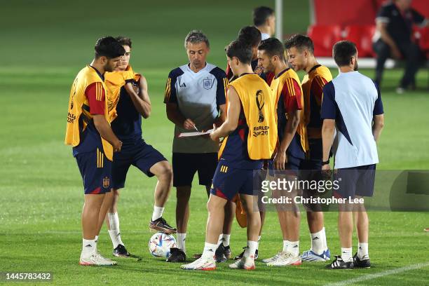 Luis Enrique, Head Coach of Spain, gives instructions during the Spain Training Session at Qatar University Training Facilities on November 30, 2022...