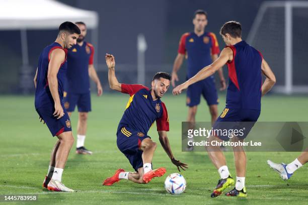 Pablo Sarabia of Spain trains with teammates during the Spain Training Session at Qatar University Training Facilities on November 30, 2022 in Doha,...
