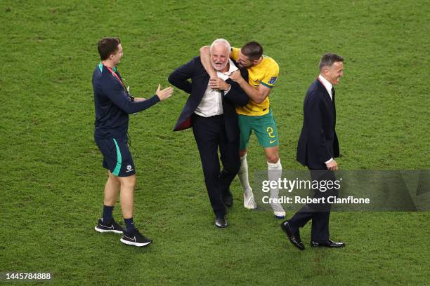 Graham Arnold, Head Coach of Australia, celebrates with Milos Degenek after the 1-0 win during the FIFA World Cup Qatar 2022 Group D match between...