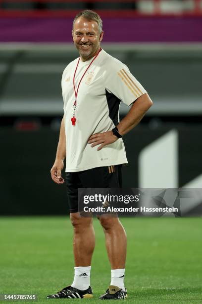 Hans-Dieter Flick, head coach of Germany smiles during the Germany Training Session at Al Shamal Stadium on November 30, 2022 in Al Ruwais, Qatar.