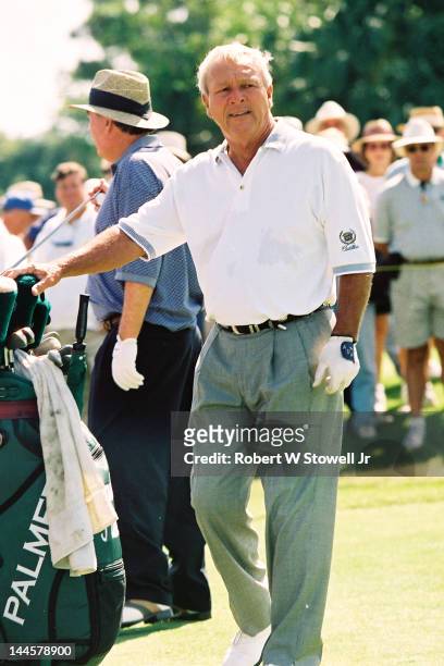 American golfer Arnold Palmer selects a club during the PGA Seniors' Championship at the PGA National Golf Club, Palm Beach Gardens, Florida, 1996.