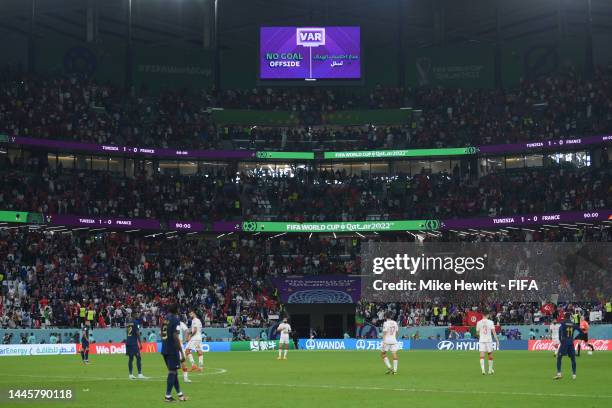 The LED board shows the VAR check which rules out a goal by Antoine Griezmann for offside during the FIFA World Cup Qatar 2022 Group D match between...