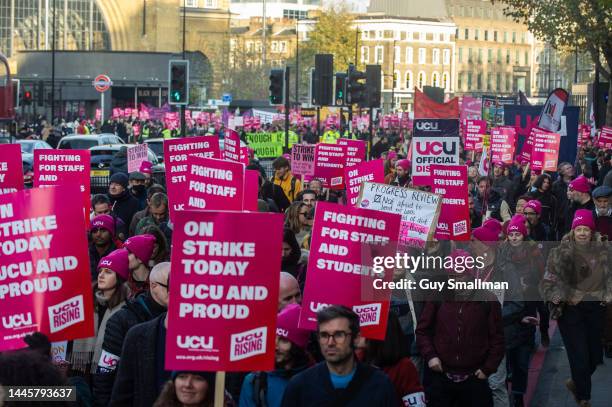 Thousands of strikers and their supporters march from Kings Cross to Birkbeck University on November 30, 2022 in London, England. Representatives of...