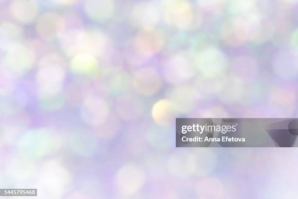 festive defocused holographic glittering background. new year and christmas celebration concept. bright backdrop for your design with copy space. it's also can be perfect background for birthday and carnival - holographic foil stock pictures, royalty-free photos & images