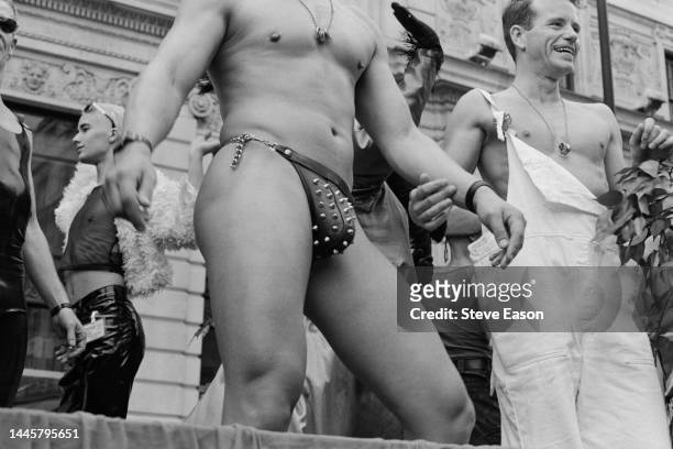 Man wearing a studded codpiece on a float at the Lesbian and Gay Pride event, London, 24th June 1995.