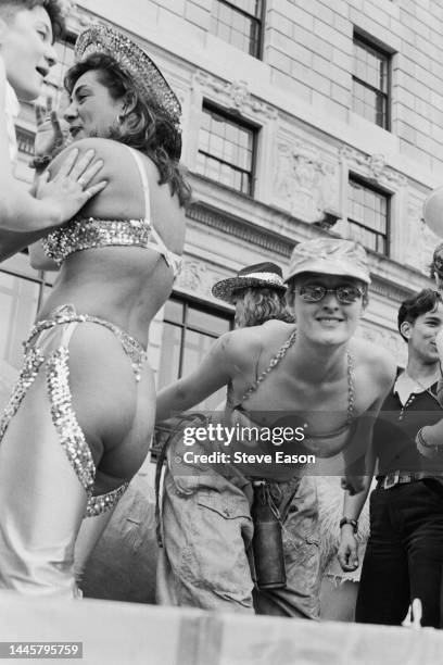 Young women in science fiction-styled costumes on a float reflecting the year's theme of lesbian visibility, at the Lesbian and Gay Pride event,...