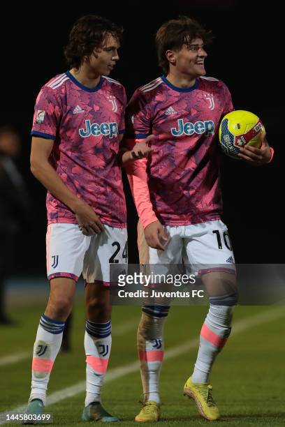Mattia Compagnon of Juventus Next Gen speaks with his teammate Martin Palumbo during the Serie C match between Feralpisalo and Juventus Next Gen at...