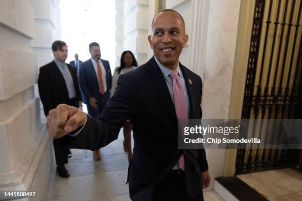 Rep. Hakeem Jeffries gets a congratulatory fist-bump as he walks into the U.S. Capitol after he was elected House Democratic leader for the 118th...