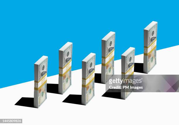 standing bundles of cash - cash contest stock pictures, royalty-free photos & images