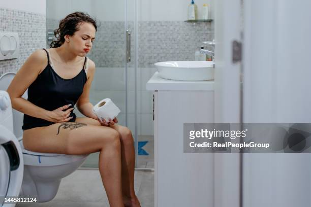 every woman know this feeling - woman hemorrhoids stock pictures, royalty-free photos & images