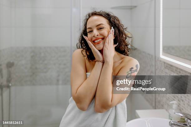 it's so good to be me! - woman bath tub wet hair stock pictures, royalty-free photos & images