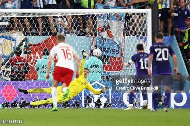 Lionel Messi of Argentina takes a penalty saved by Wojciech Szczesny of Poland during the FIFA World Cup Qatar 2022 Group C match between Poland and...