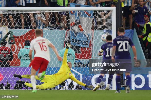 Lionel Messi of Argentina takes a penalty saved by Wojciech Szczesny of Poland during the FIFA World Cup Qatar 2022 Group C match between Poland and...