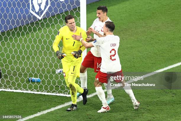 Wojciech Szczesny of Poland reacts after saving a penalty from Lionel Messi of Argentina during the FIFA World Cup Qatar 2022 Group C match between...