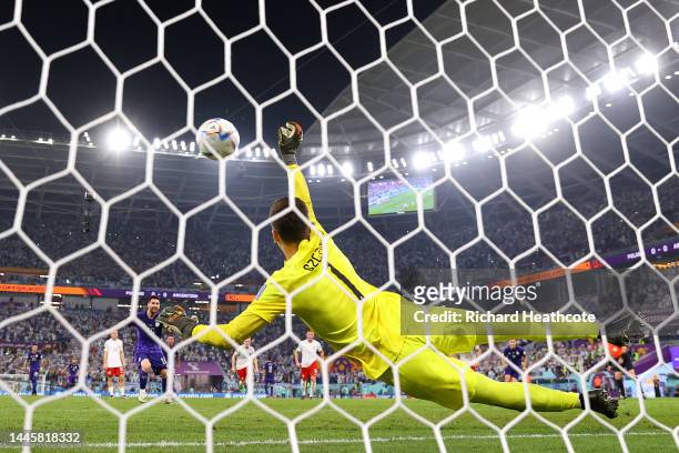 Lionel Messi of Argentina takes a penalty saved by Wojciech Szczesny of Poland during the FIFA World Cup Qatar 2022 Group C match between Poland and...