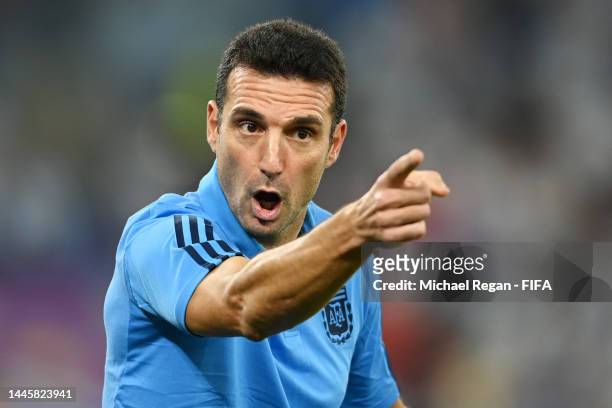 Lionel Scaloni, Head Coach of Argentina, gives their team instructions during the FIFA World Cup Qatar 2022 Group C match between Poland and...